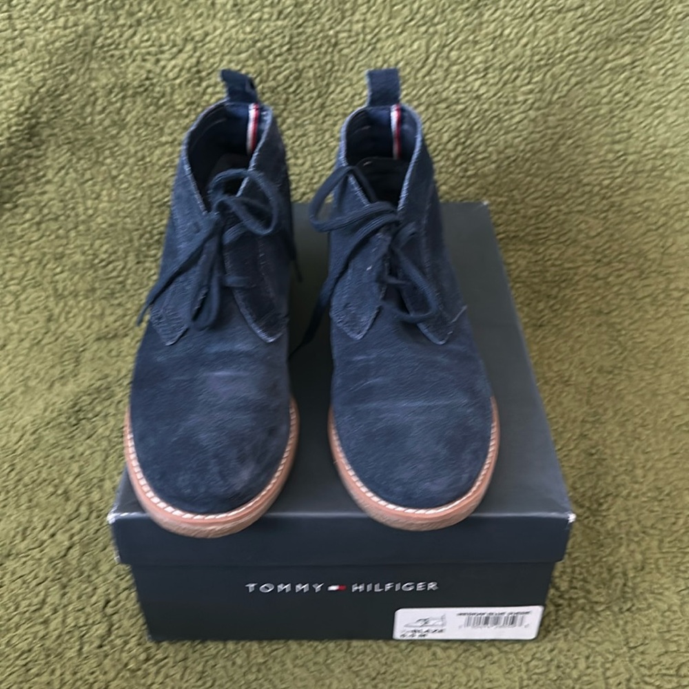 Blue suede tie up booties by Tommy Hilfiger
Dark blue